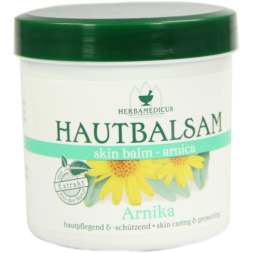 Wei&szlig;e Dose mit gr&uuml;nem Deckel und der Aufschrift "Hautbalsam Arnika".