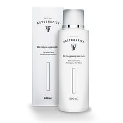 Wei&szlig;e Flasche und Verpackung von Reinigungsmilch mit schwarzem Text.